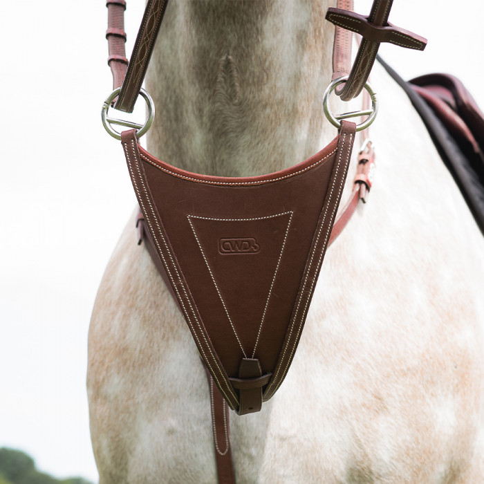 Raised bib martingale attachment